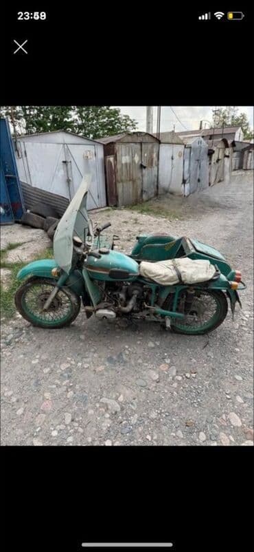 кофры для мотоцикла: Мотоцикл с коляской цвета морской волны, оснащенный высоким лобовым — 1