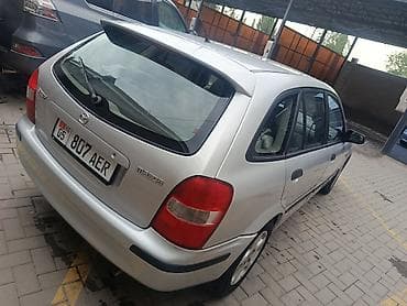 бакту долонотуу: Mazda 323: 2000 г., 1.5 л, Кол менен иштөөчү, Бензин, Хетчбек — 5