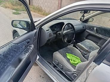 mazda demio капот: Mazda 323: 2000 г., 1.6 л, Механика, Бензин, Хэтчбэк — 7