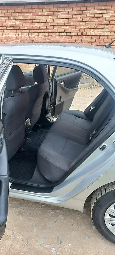 mini kuper: Toyota Corolla: 2004 г., Бензин, Седан — 7