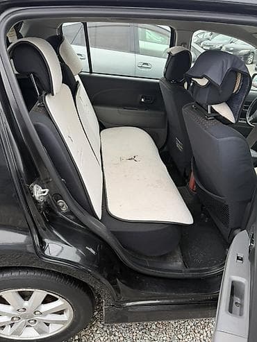 обмен на 5 5: Daihatsu Sirion: 2009 г., 1.2 л, Автомат, Бензин — 4