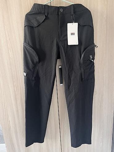 Черные мужские брюки-карго с множеством функциональных карманов