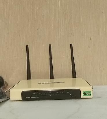TP-Link TL-WR940N + коммутатор TP-Link - Беспроводной маршрутизатор