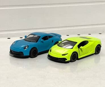 игрушечное оружие nerf: Металлическая машинка-игрушка спортивного купе (масштаб приблизительно — 4