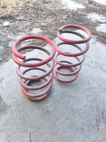 Продаю передние пружины красные с занижением на БМВ Е34 держак на at lalafo.kg Продаю передние пружины красные с занижением на БМВ Е34 держак на