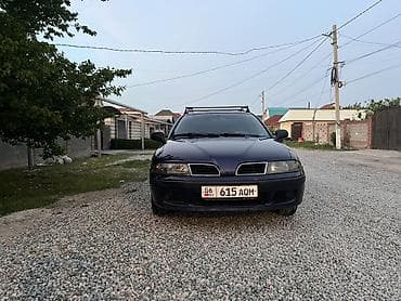 муссо автомобиль: Mitsubishi Carisma: 2000 г., Газ, Седан — 9