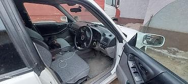 споллер: Subaru Forester: 2001 г., 2 л, Автомат, Газ, Универсал — 2