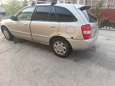 gs300 160: Mazda 323: 2002 г., 1.5 л, Механика, Бензин, Универсал — 3