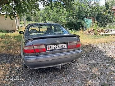 Унаа: Toyota Carina E: 1994 г., Кол менен иштөөчү, Бензин, Седан — 3