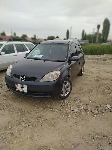 Mazda Demio: 2005 г., 1.3 л, Автомат, Бензин, Хэтчбэк