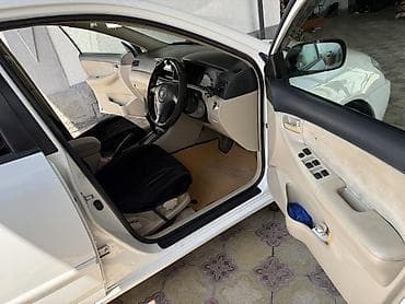 2 8: Toyota Allex: 2003 г., Бензин — 9