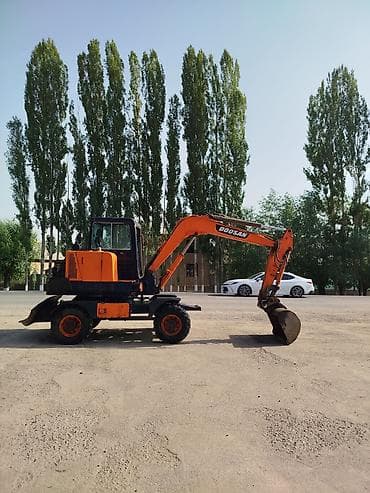 купить колесный экскаватор бу: Экскаватор, Doosan, 1999 г., Колесный — 5