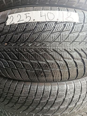 58 40: Всесезонная автомобильная шина размером 225/40 R18. Шина имеет — 2