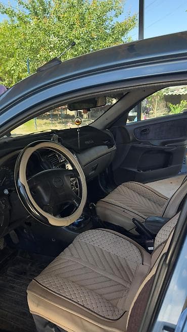 Mazda 626: 1997 г., 1.8 л, Механика, Бензин, Седан
