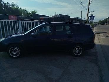 два авто: Ford Focus: 2000 г., 0.2 л, Механика, Бензин, Универсал — 5