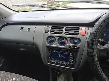 daihatsu core: Автомобиль: компактный праворульный хэтчбек/минивэн серебристого — 4