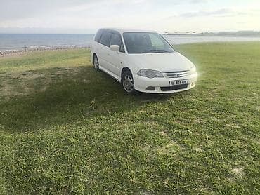 90: Honda Odyssey: 1999 г., Автомат, Бензин, Минивэн — 1