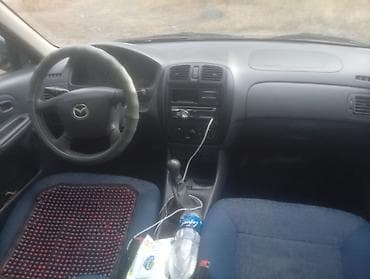 e klass: Mazda 323: 2000 г., Механика, Бензин — 5