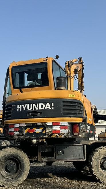 bmw cs: Экскаватор, Hyundai, 2013 г., Колесный — 2