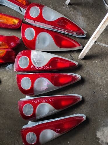 Detali: Задняя оптика на Тойоту фанкарго