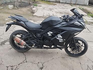 спартивный мото: Kawasaki Ninja (спортивный мотоцикл) в матово‑чёрном цвете. Основные — 2