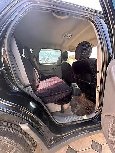 Mazda Tribute: 2001 г., 2 л, Механика, Бензин, Жол тандабас — 6