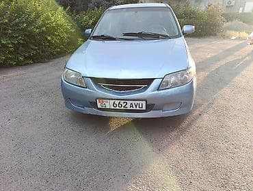 bvd e2: Mazda 323: 2003 г., 1.6 л, Механика, Бензин, Универсал — 2