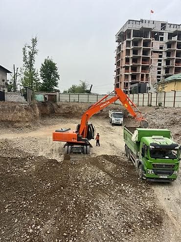 tx3 mini: Услуги экскаватора-погрузчика и самосвалов для земляных работ - — 2