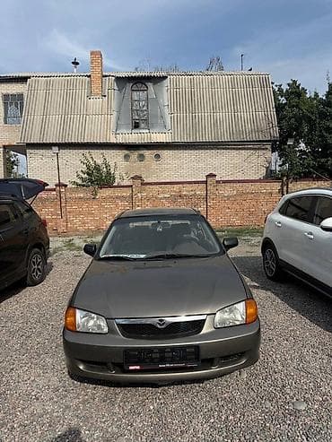Продажа авто: Mazda Protege: 2000 г., 2 л, Автомат, Бензин, Седан — 1