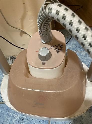 weight machine: Отпариватель для одежды.Midea — 2