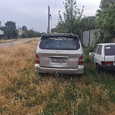 Унаа: Kia Carnival: 1998 г., 2.9 л, Кол менен иштөөчү, Дизель, Вэн/Минивэн — 8