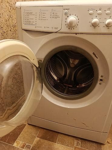 70: Стиральная машина Indesit IWSC 6105, фронтальная загрузка — 5