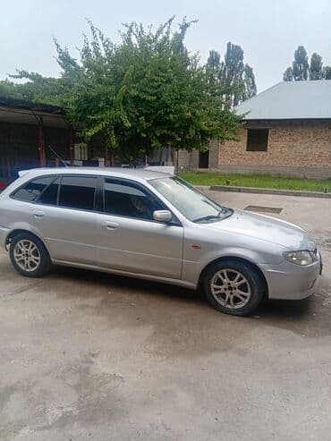 автомобиль бу: Mazda 323: 2003 г., 1.3 л, Механика, Бензин, Хетчбек — 1