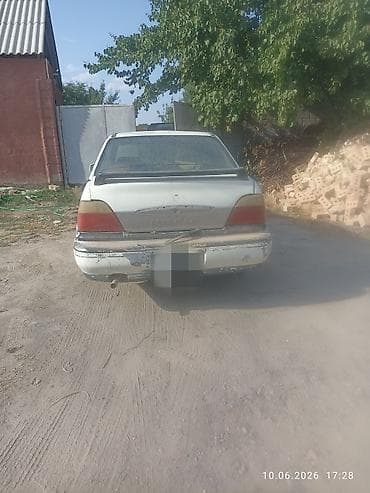 Daewoo Nexia: 1998 г., 1.5 л, Механика, Бензин, Седан