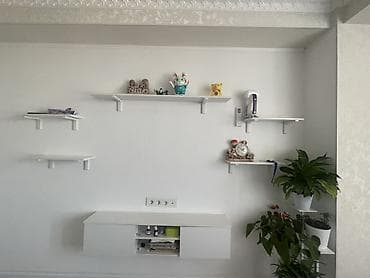 Настенная система хранения и декора в белом цвете Состав: - Подвесная