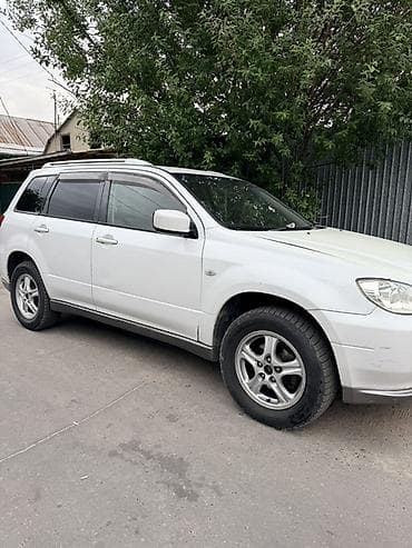 фара на 211: Mitsubishi Airtrek: 2002 г., 2 л, Автомат, Газ, Кроссовер — 2