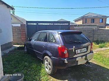 fit shuttle: Mazda 323: 2002 г., 1.6 л, Ручные, Бензин, Хэтчбэк — 4