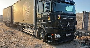 грузовой актрос: Тягач, Mercedes-Benz, 2009 г., Тентованный — 2