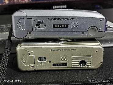 alcatel lucent: Пленочные компактные фотоаппараты Olympus — две модели: 1) Olympus — 2