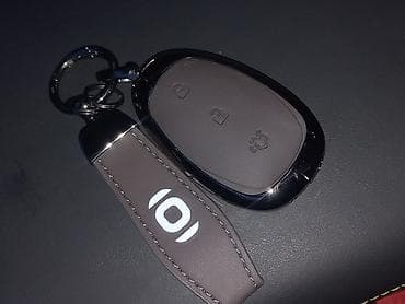 Аксессуары для салона: Продаётся чехол для ключей CHANGAN Q05 коричневый цвет доставка — 4