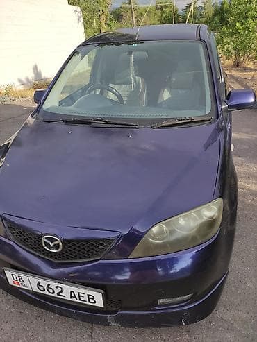 Mazda Demio: 2003 г., 1.3 л, Автомат, Газ, Хетчбек — 1