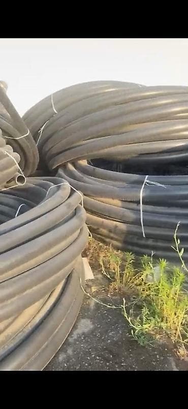 оборудование для воды: ПЭ труба в бухтах (полиэтилен низкого давления, черная) Описание: - — 2