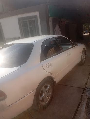 tesla p40: Mazda 626: 1992 г., 1.8 л, Механика, Бензин, Седан — 2