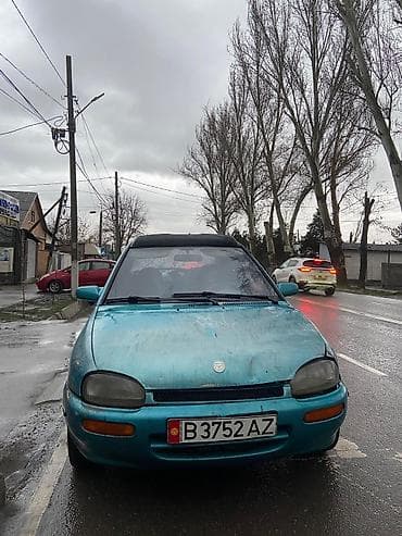 e53 4 8: Mazda 121: 1992 г., 1.3 л, Механика, Бензин — 4