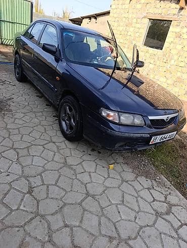 глушитель насадка: Mazda 626: 1998 г., 1.8 л, Механика, Бензин, Седан — 2