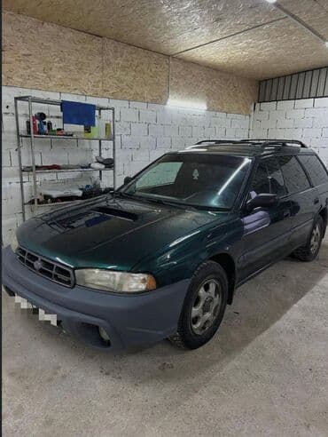 Легковой автомобиль универсал, темно-зеленый металлик. Subaru Legacy