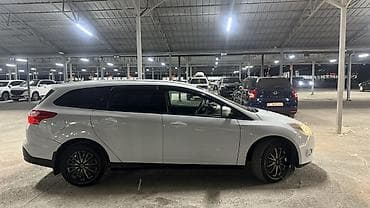 byd e9: Ford Focus: 2015 г., 1.6 л, Механика, Бензин, Универсал — 4