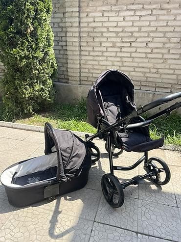 Коляски: Детская коляска 2-в-1 (люлька + прогулочный блок), цвет черный — 1