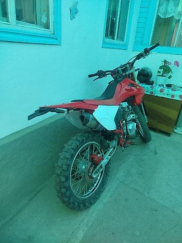 step rf1: Кроссовый мотоцикл (эндуро) красного цвета Описание: - Класс — 3