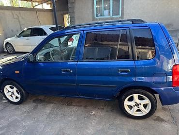 Транспорт: Mazda Demio: 2000 г., 1.5 л, Кол менен иштөөчү, Бензин, Хетчбек — 2